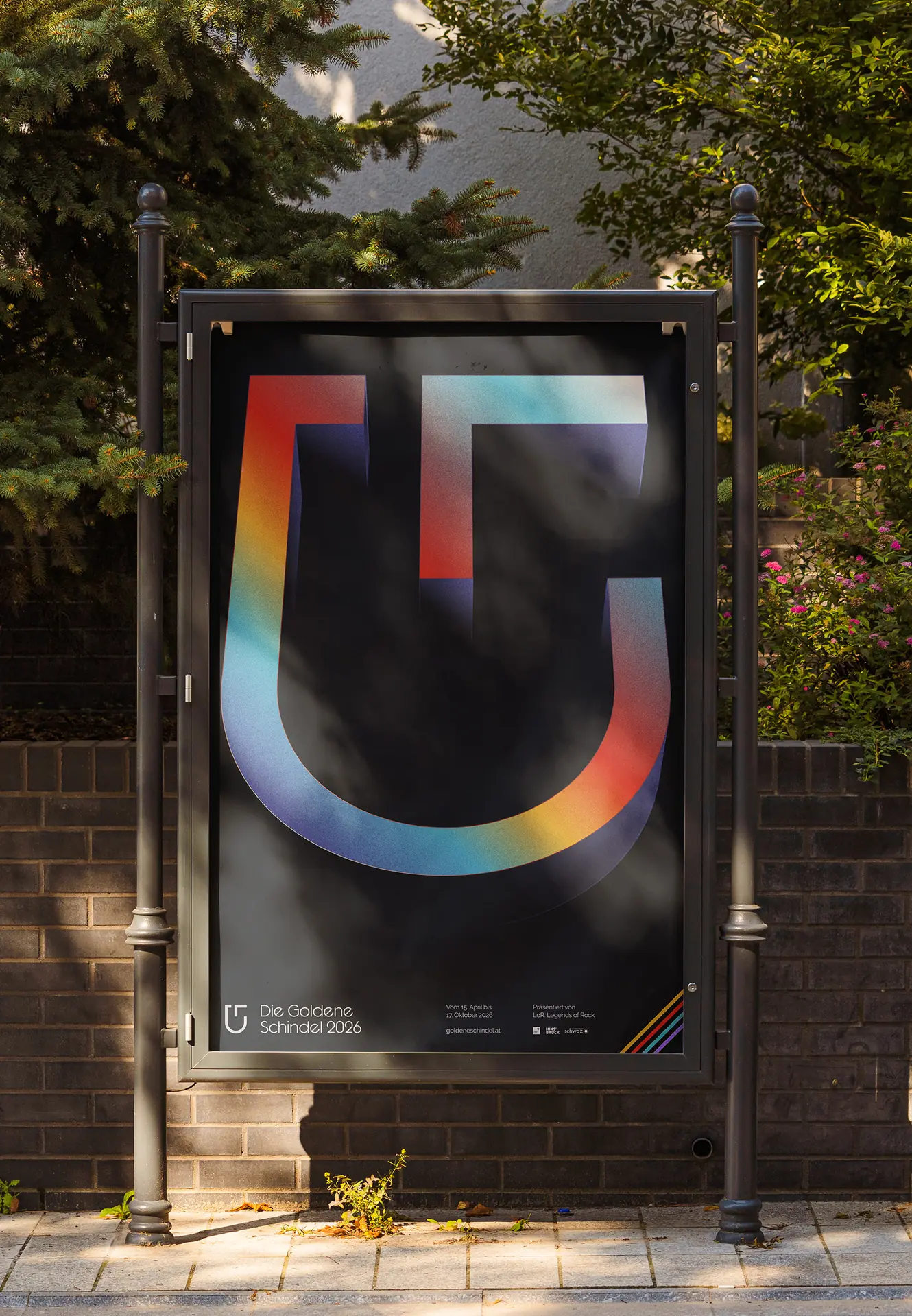 A billboard with the colourful shingle of the 2026 edition